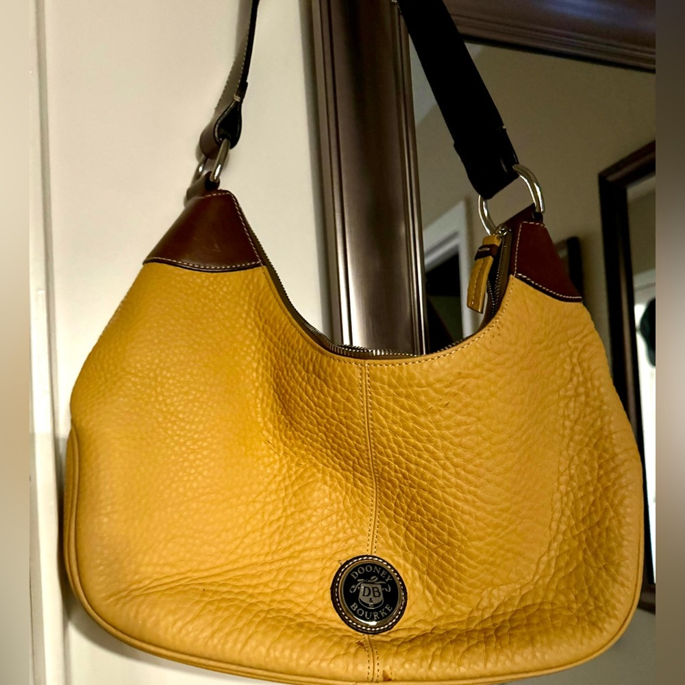 Mustard yellow Dooney and Bourke purse.